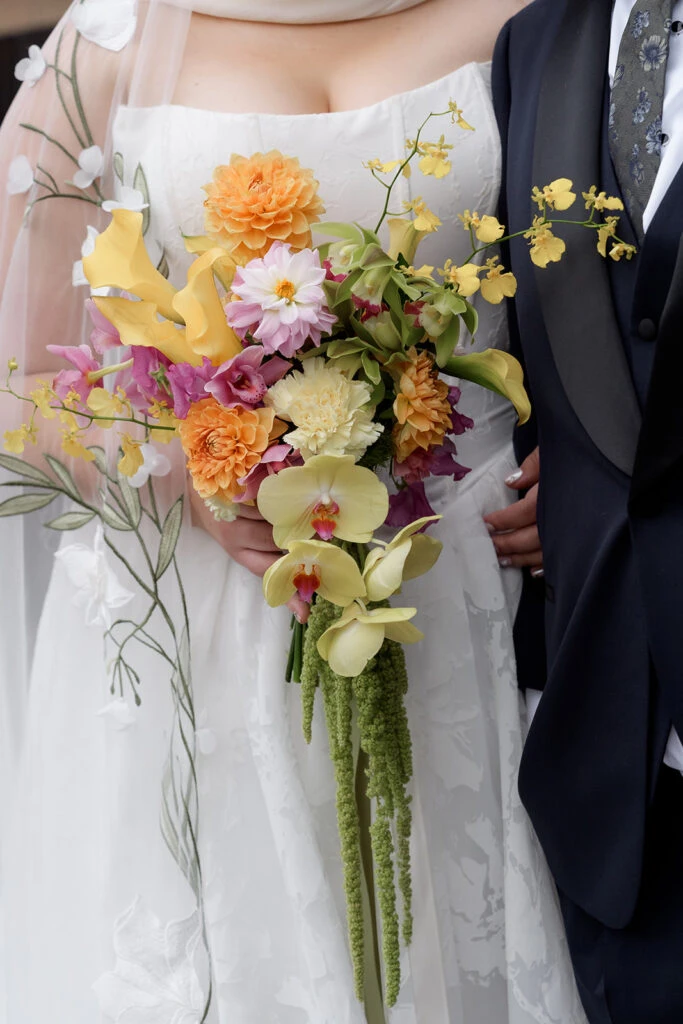 True bride Seyma posing with her wedding bouquet