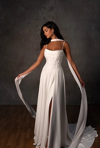 Bride wearing A-line crepe wedding gown with draped neckline and bodice, Essense of Australia D4312