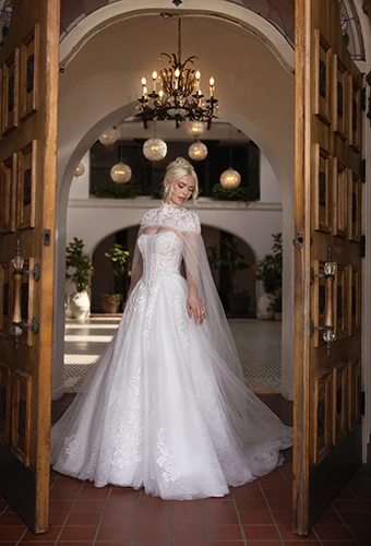 Bride wearing strapless ballgown tulle wedding dress, Essense of Australia D4553