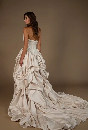 Bride wearing bronze strapless wedding dress 