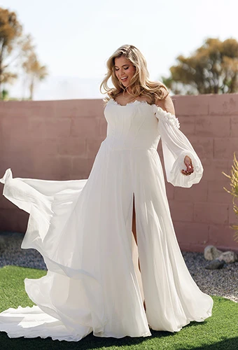 Plus-size brides wearing A-line wedding dress with floral neckline and corset bodice, Stella York SY8244+